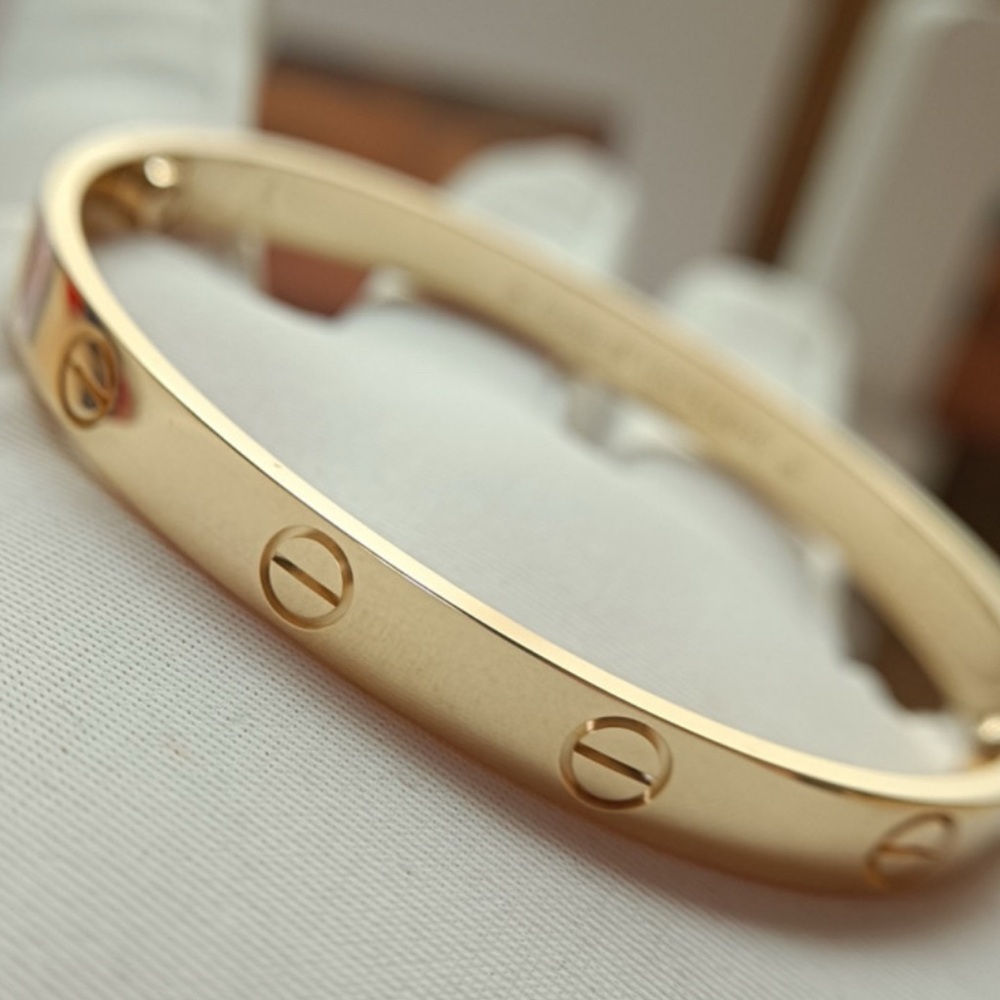 Screw Motif Gold Bangle Bracelet with Screwdriver.